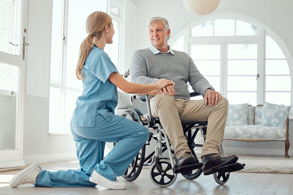 a young nurse caring for an older man